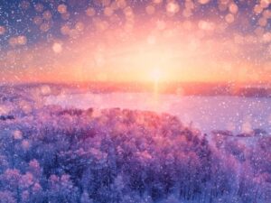 Snowy magical winter landscape at sunset